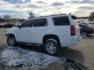 2019 Chevrolet Tahoe LT with VIN 1GNSCBKC0KR368493, listed as a Copart auction lot 89115355 with 126,878 mi miles and Salvage Title. Bid and sale history available at carsss.com. Image 2.