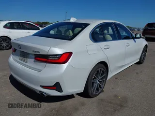 2021 BMW 3 Series 330i xDrive with VIN WBA5R7C0XMFK54525, listed as a IAAI auction lot 42320181 with 54,576 mi miles and . Bid and sale history available at DreamBid. Image 4.