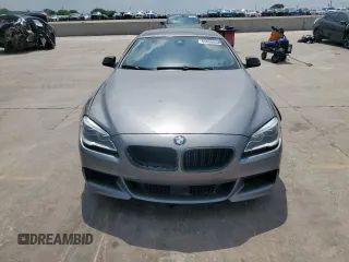 2018 BMW 6 Series 650i z VIN WBA6D4C59JD981398, wystawiony jako Copart lot #53455655 z przebiegiem 19 752 mil mil oraz Szkody całkowita. Historia ofert i sprzedaży dostępna na DreamBid. Obrazek 5.