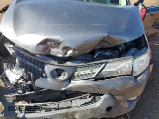 2013 Toyota RAV4 Limited z VIN 2T3DFREV0DW009906, wystawiony jako Copart lot #60857305 z przebiegiem 150 944 mil mil oraz Szkoda całkowita • Salvage title. Historia ofert i sprzedaży dostępna na DreamBid. Obrazek 12.