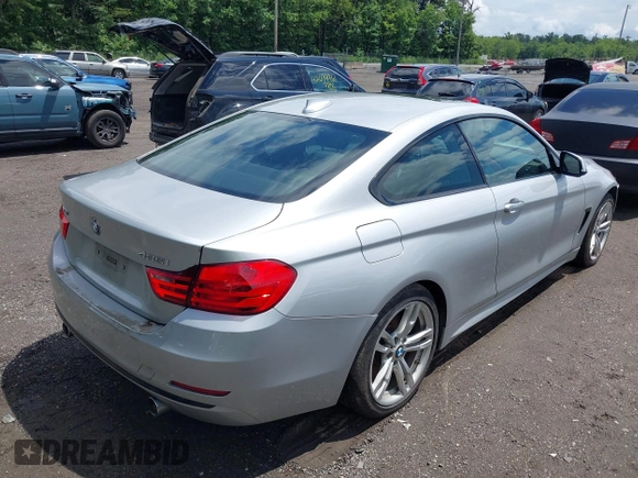 2014 BMW 4 Series 435i xDrive with VIN WBA3R5C55EK186196, listed as a IAAI auction lot 42678249 with 71,362 mi miles and . Bid and sale history available at DreamBid. Image 4.