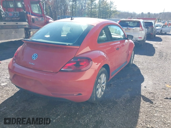 2017 Volkswagen Beetle 1.8T Fleet with VIN 3VWF17AT7HM618771, listed as a IAAI auction lot 41595088 with 67,943 mi miles. Bid and sale history available at carsss.com. Image 4.