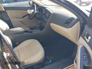 2014 Kia Optima EX with VIN 5XXGN4A70EG277871, listed as a IAAI auction lot 42183248 with 128,300 mi miles and . Bid and sale history available at carsss.com. Image 5.