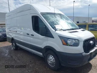 2023 Ford Transit Cargo z VIN 1FTBR3U80PKB02039, wystawiony jako IAAI lot #42451740 z przebiegiem 56 966 mil mil oraz . Historia ofert i sprzedaży dostępna na DreamBid. Obrazek 1.