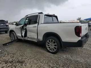 2023 Honda Ridgeline RTL-E with VIN 5FPYK3F76PB064582, listed as a Copart auction lot 63629375 with 11,940 mi miles and Salvage title. Bid and sale history available at DreamBid. Image 2.