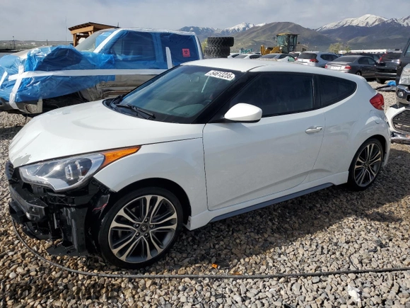 2016 Hyundai Veloster Turbo z VIN KMHTC6AE6GU302201, wystawiony jako Copart lot #54613235 z przebiegiem 105 796 mil mil oraz Szkoda całkowita • Salvage title. Historia ofert i sprzedaży dostępna na DreamBid. Obrazek 1.