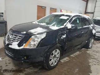 2014 Cadillac SRX Luxury Collection with VIN 3GYFNEE31ES561037, listed as a IAAI auction lot 41373540 with 126,108 mi miles. Bid and sale history available at carsss.com. Image 2.