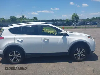 2016 Toyota RAV4 XLE with VIN JTMRFREV0GJ073114, listed as a IAAI auction lot 42548094 with 119,431 mi miles and . Bid and sale history available at DreamBid. Image 13.