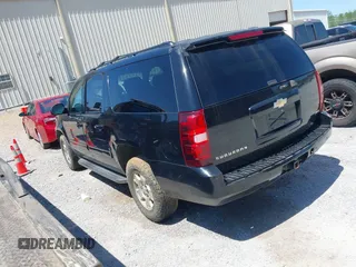 2011 Chevrolet Suburban LT with VIN 1GNSCJE09BR319675, listed as a IAAI auction lot 41966225 with 294,335 mi miles. Bid and sale history available at carsss.com. Image 3.