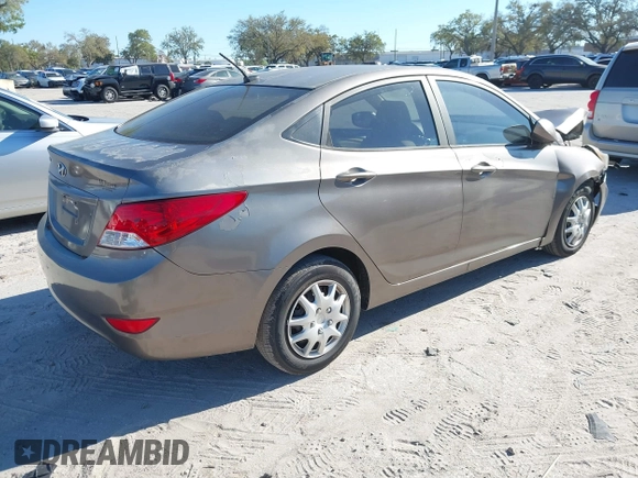 2014 Hyundai Accent GLS with VIN KMHCT4AE6EU639694, listed as a IAAI auction lot 41674605 with 101,549 mi miles and . Bid and sale history available at carsss.com. Image 4.