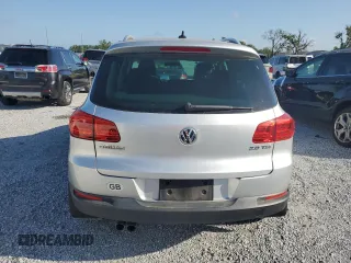 2012 Volkswagen Tiguan SE with VIN WVGAV7AX9CW607599, listed as a Copart auction lot 51214455 with 131,109 mi miles and Salvage Title. Bid and sale history available at DreamBid. Image 6.