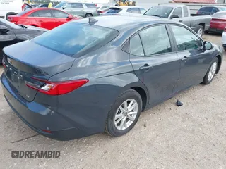 2025 Toyota Camry LE with VIN 4T1DAACK5SU522373, listed as a IAAI auction lot 42094179 with 6,264 mi miles and . Bid and sale history available at DreamBid. Image 4.