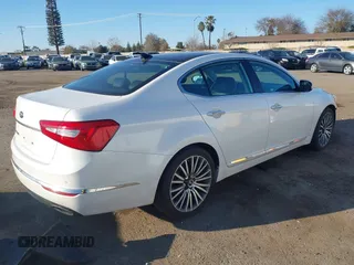 2015 Kia Cadenza Premium with VIN KNALN4D78F5183170, listed as a IAAI auction lot 41434649 with 101,443 mi miles. Bid and sale history available at carsss.com. Image 4.