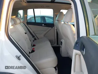 2010 Volkswagen Tiguan SEL with VIN WVGBV7AX4AW514362, listed as a IAAI auction lot 41413300 with 154,201 mi miles and . Bid and sale history available at DreamBid. Image 8.