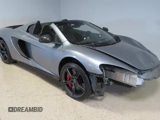 2016 McLaren 650S z VIN SBM11FAA1GW006061, wystawiony jako Copart lot #58605735 z przebiegiem 16 999 mil mil oraz Szkody całkowita. Historia ofert i sprzedaży dostępna na DreamBid. Obrazek 1.