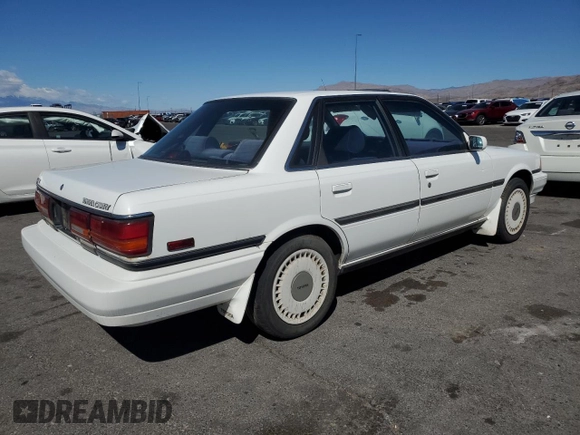 1991 Toyota Camry z VIN 4T1VV22E9MU060249, wystawiony jako Copart lot #51387785 z przebiegiem 153 405 mil mil oraz Czysty tytuł • Clean title. Historia ofert i sprzedaży dostępna na DreamBid. Obrazek 3.