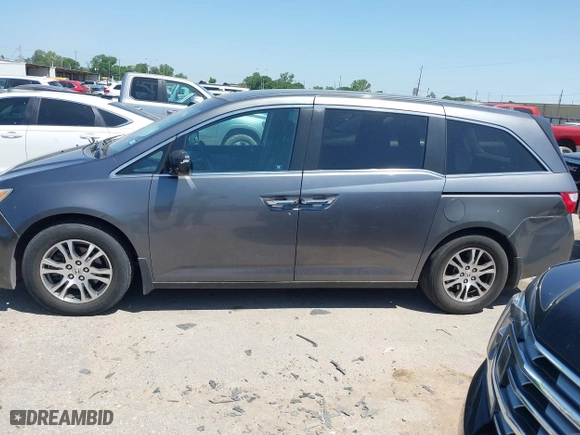 2012 Honda Odyssey EX with VIN 5FNRL5H49CB139262, listed as a IAAI auction lot 42024256 with 124,695 mi miles. Bid and sale history available at carsss.com. Image 14.