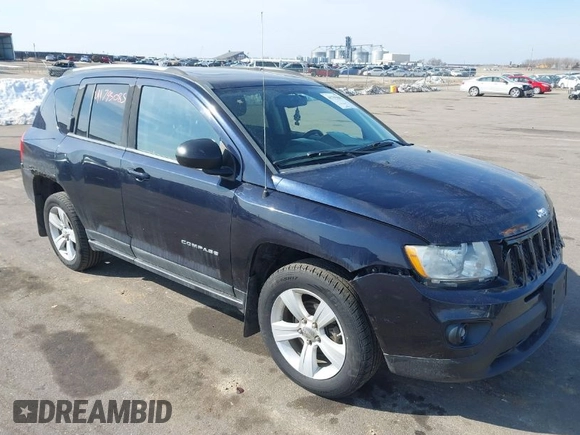 2011 Jeep Compass with VIN 1J4NT1FA7BD208658, listed as a IAAI auction lot 41795085 with 198,880 mi miles. Bid and sale history available at carsss.com. Image 1.