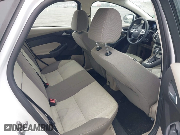 2013 Ford Focus SE with VIN 1FADP3F29DL306051, listed as a IAAI auction lot 42457611 with 86,817 mi miles and . Bid and sale history available at DreamBid. Image 8.