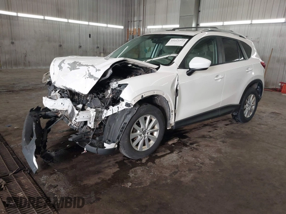 2014 Mazda CX-5 Touring with VIN JM3KE4CY4E0321055, listed as a IAAI auction lot 41613593 with 174,339 mi miles. Bid and sale history available at carsss.com. Image 18.