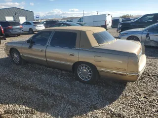1999 Cadillac DeVille DHS with VIN 1G6KE54Y5XU721363, listed as a Copart auction lot 79227924 with 0 mi miles and Salvage Title. Bid and sale history available at carsss.com. Image 2.