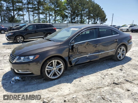 2013 Volkswagen CC Lux with VIN WVWRN7AN4DE546711, listed as a Copart auction lot 52673205 with 106,700 mi miles and Salvage Title. Bid and sale history available at DreamBid. Image 1.