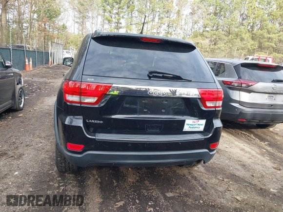 2012 Jeep Grand Cherokee Laredo with VIN 1C4RJEAG0CC316823, listed as a IAAI auction lot 41846479 with 215,317 mi miles. Bid and sale history available at carsss.com. Image 16.