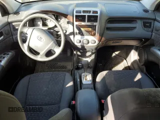 2007 Kia Sportage LX z VIN KNDJE723X77430674, wystawiony jako Copart lot #57050615 z przebiegiem 136 731 mil mil oraz Szkoda całkowita • Salvage title. Historia ofert i sprzedaży dostępna na DreamBid. Obrazek 8.