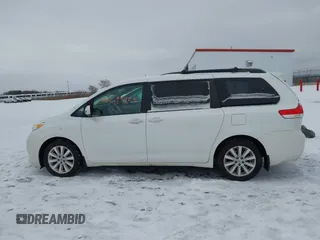 2013 Toyota Sienna XLE with VIN 5TDDK3DC2DS053559, listed as a IAAI auction lot 41299824 with 175,611 mi miles and . Bid and sale history available at DreamBid. Image 15.