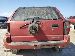 2000 Honda Passport LX with VIN 4S6CK58W6Y4403629, listed as a Copart auction lot 51214365 with 0 mi miles and Salvage Title. Bid and sale history available at carsss.com. Image 6.
