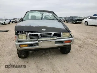 1995 Nissan Frontier XE with VIN 1N6SD11Y2SC308065, listed as a Copart auction lot 45282595 with 51,994 mi miles and Salvage title. Bid and sale history available at DreamBid. Image 11.