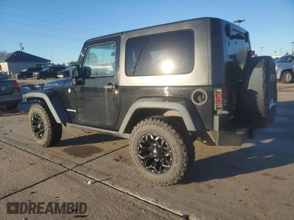 2010 Jeep Wrangler Rubicon with VIN 1J4BA6D10AL203265, listed as a Copart auction lot 79570754 with 114,840 mi miles and Salvage title. Bid and sale history available at DreamBid. Image 2.