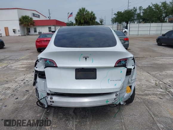 2023 Tesla Model Y Long Range z VIN 7SAYGDEE0PA065534, wystawiony jako IAAI lot #42445868 z przebiegiem 22 638 mil mil oraz . Historia ofert i sprzedaży dostępna na DreamBid. Obrazek 16.