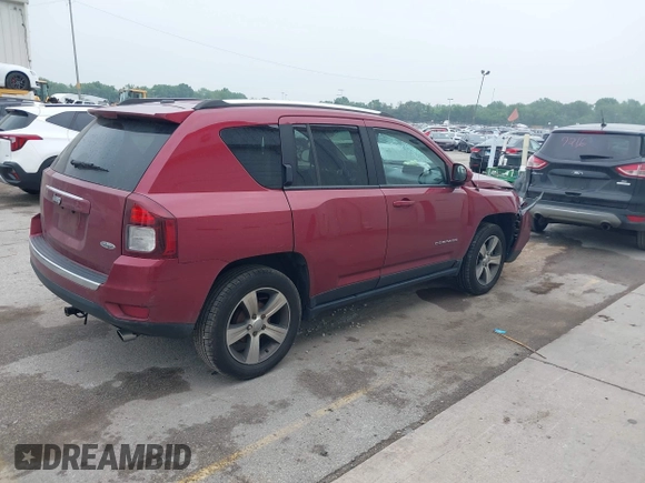 2016 Jeep Compass Latitude with VIN 1C4NJCEA3GD760867, listed as a IAAI auction lot 42496448 with 144,353 mi miles and . Bid and sale history available at DreamBid. Image 4.