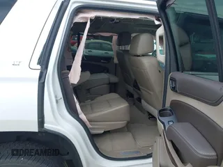 2020 Chevrolet Tahoe LT with VIN 1GNSCBKC4LR181887, listed as a IAAI auction lot 42160821 with 106,757 mi miles and . Bid and sale history available at DreamBid. Image 8.