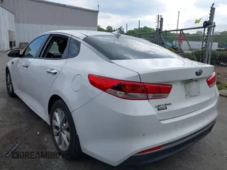 2018 Kia Optima LX with VIN 5XXGT4L30JG256660, listed as a IAAI auction lot 42005531 with 100,337 mi miles and . Bid and sale history available at DreamBid. Image 3.