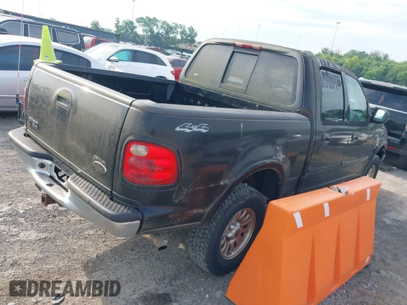 2001 Ford F-150 XLT with VIN 1FTRW08L61KD90032, listed as a IAAI auction lot 42385610 with 164,252 mi miles and . Bid and sale history available at DreamBid. Image 4.