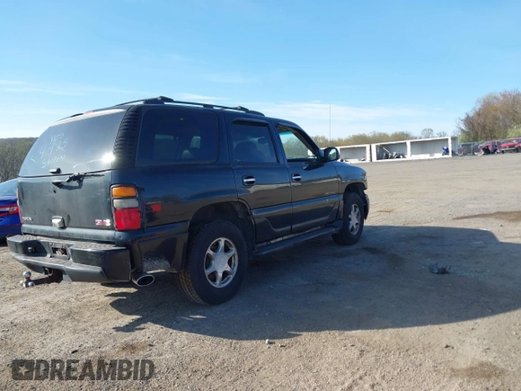 2005 GMC Yukon Denali z VIN 1GKEK63U55J254214, wystawiony jako IAAI lot #42103378 z przebiegiem 131 183 mil mil oraz . Historia ofert i sprzedaży dostępna na DreamBid. Obrazek 4.