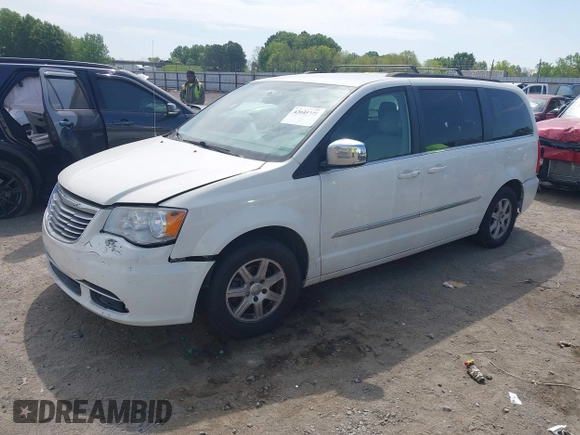 2012 Chrysler Town & Country Touring L with VIN 2C4RC1CG7CR156415, listed as a IAAI auction lot 42045371 with 233,306 mi miles and . Bid and sale history available at carsss.com. Image 2.