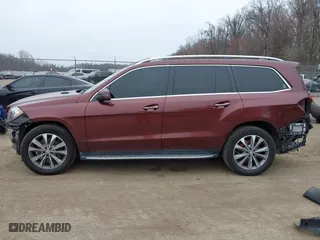 2014 Mercedes-Benz GL-Class GL 450 with VIN 4JGDF7CE3EA376091, listed as a IAAI auction lot 41696697 with 156,049 mi miles. Bid and sale history available at carsss.com. Image 14.
