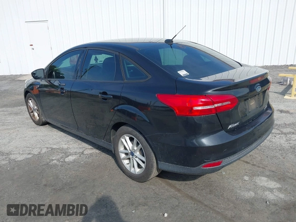 2015 Ford Focus SE with VIN 1FADP3F28FL321451, listed as a IAAI auction lot 42078087 with 181,494 mi miles and . Bid and sale history available at carsss.com. Image 3.