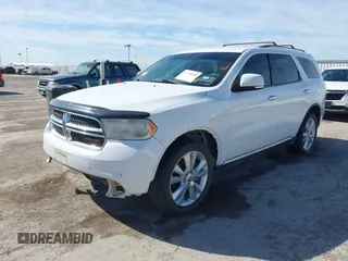 2013 Dodge Durango Crew with VIN 1C4SDJDT6DC510333, listed as a IAAI auction lot 41776099 with 180,431 mi miles and . Bid and sale history available at DreamBid. Image 17.