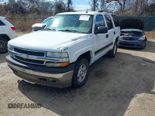 2005 Chevrolet Tahoe LS with VIN 1GNEK13T65J198121, listed as a IAAI auction lot 41826459 with 233,718 mi miles and . Bid and sale history available at DreamBid. Image 2.