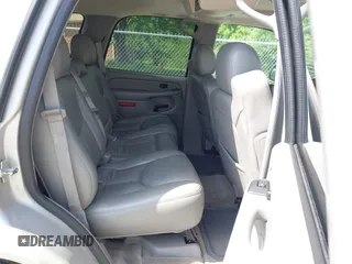 2005 GMC Yukon SLT z VIN 1GKEK13T35R127330, wystawiony jako IAAI lot #42138030 z przebiegiem 195 079 mil mil oraz . Historia ofert i sprzedaży dostępna na DreamBid. Obrazek 8.