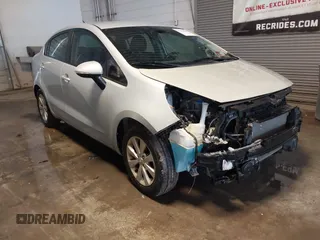 2014 Kia Rio EX with VIN KNADN4A35E6337963, listed as a IAAI auction lot 41250236 with 44,388 mi miles. Bid and sale history available at carsss.com. Image 1.