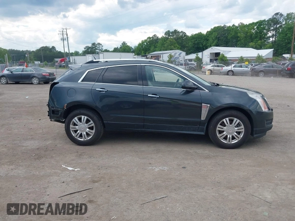 2014 Cadillac SRX Luxury Collection z VIN 3GYFNEE38ES626949, wystawiony jako IAAI lot #42194679 z przebiegiem 173 303 mil mil oraz . Historia ofert i sprzedaży dostępna na DreamBid. Obrazek 13.