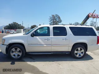 2008 Chevrolet Suburban LTZ with VIN 1GNFC16058R198040, listed as a IAAI auction lot 41421238 with 215,591 mi miles. Bid and sale history available at carsss.com. Image 14.