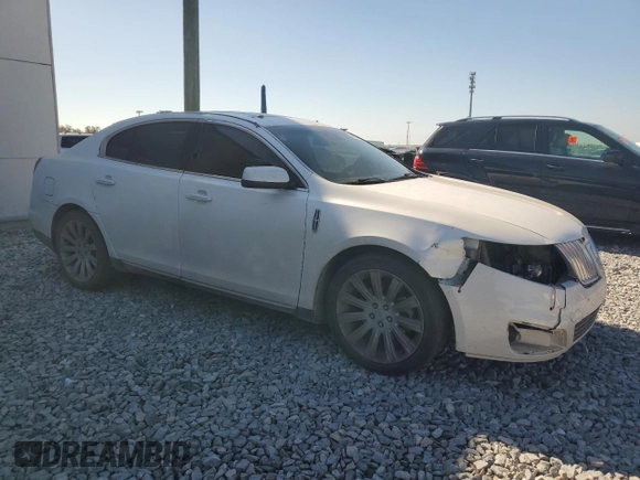 2012 Lincoln MKS with VIN 1LNHL9DR1CG805164, listed as a Copart auction lot 48375595 with 104,246 mi miles and Salvage Title. Bid and sale history available at carsss.com. Image 4.
