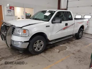 2005 Ford F-150 XLT with VIN 1FTPX14565FB60720, listed as a IAAI auction lot 41728673 with 148,187 mi miles. Bid and sale history available at carsss.com. Image 2.
