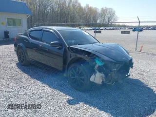 2013 Dodge Avenger SXT with VIN 1C3CDZCB5DN715694, listed as a IAAI auction lot 41943286 with 218,954 mi miles and . Bid and sale history available at DreamBid. Image 1.